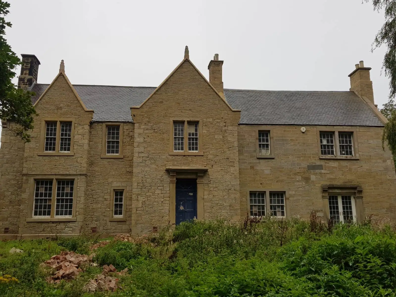 Sandstone house after cleaning, typical of the work in our shot blasting reviews