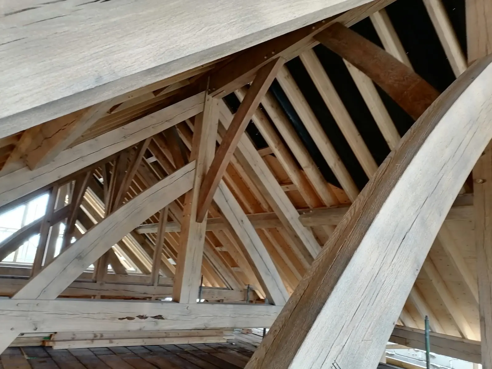 Oak roof trusses after blast cleaning