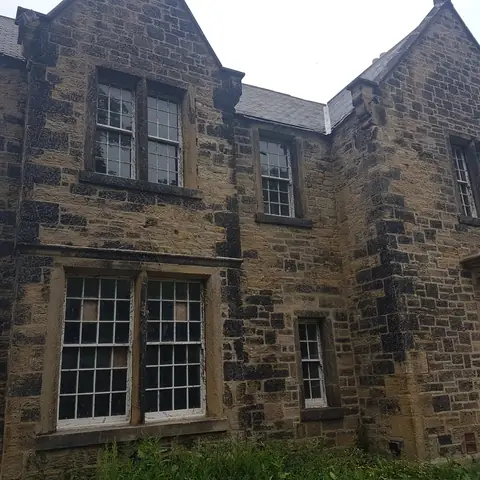 Sandstone house front before stone cleaning