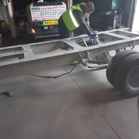 Chassis blasted and primed in workshop