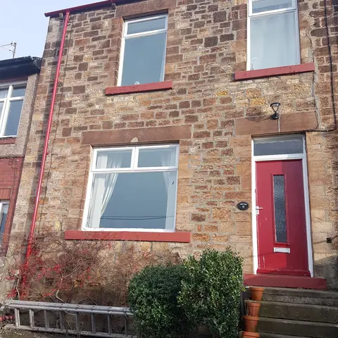 Cleaned sandstone terraced house