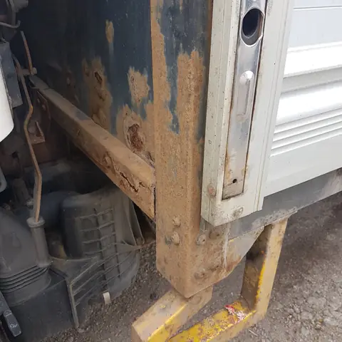 Corroded chassis rail before blasting