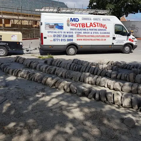 Blasting van on site with reclaimed stone