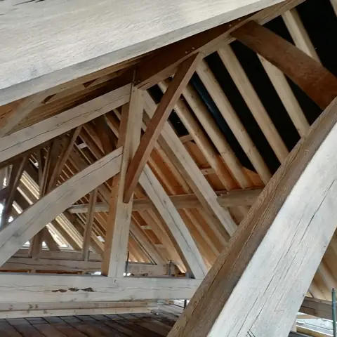 Oak roof trusses after blast cleaning