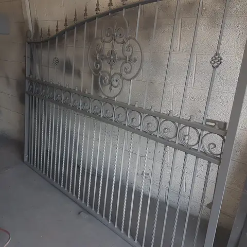 Wrought iron gates blasted to bare metal