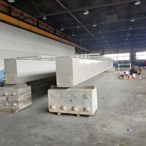 Steel beams primed after blasting