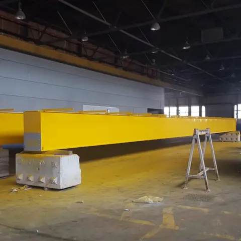 Yellow painted steel beam in warehouse