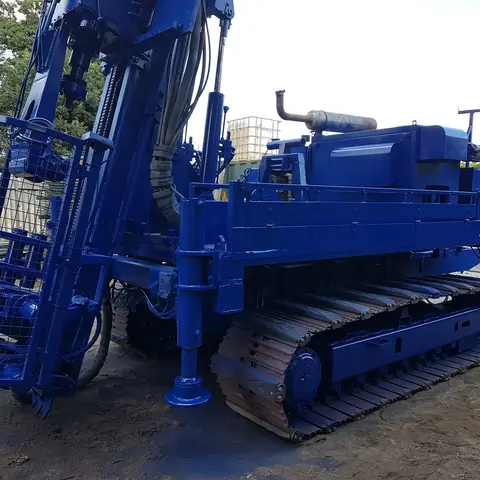 Tracked drilling rig painted blue